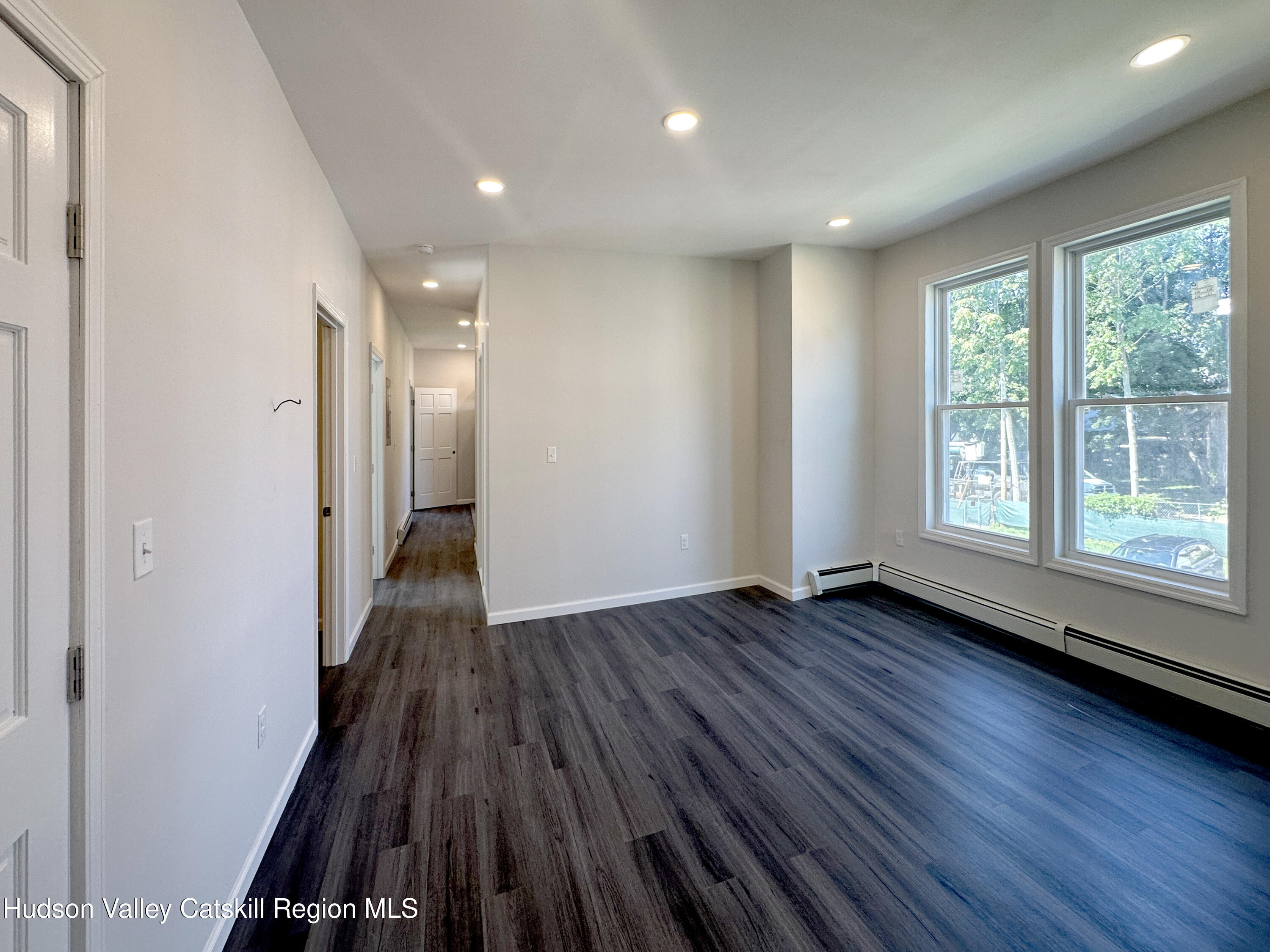228 Mansion Street Poughkeepsie, NY 12601 - Photo 18 of 35 a view of a room with wooden floor and window
