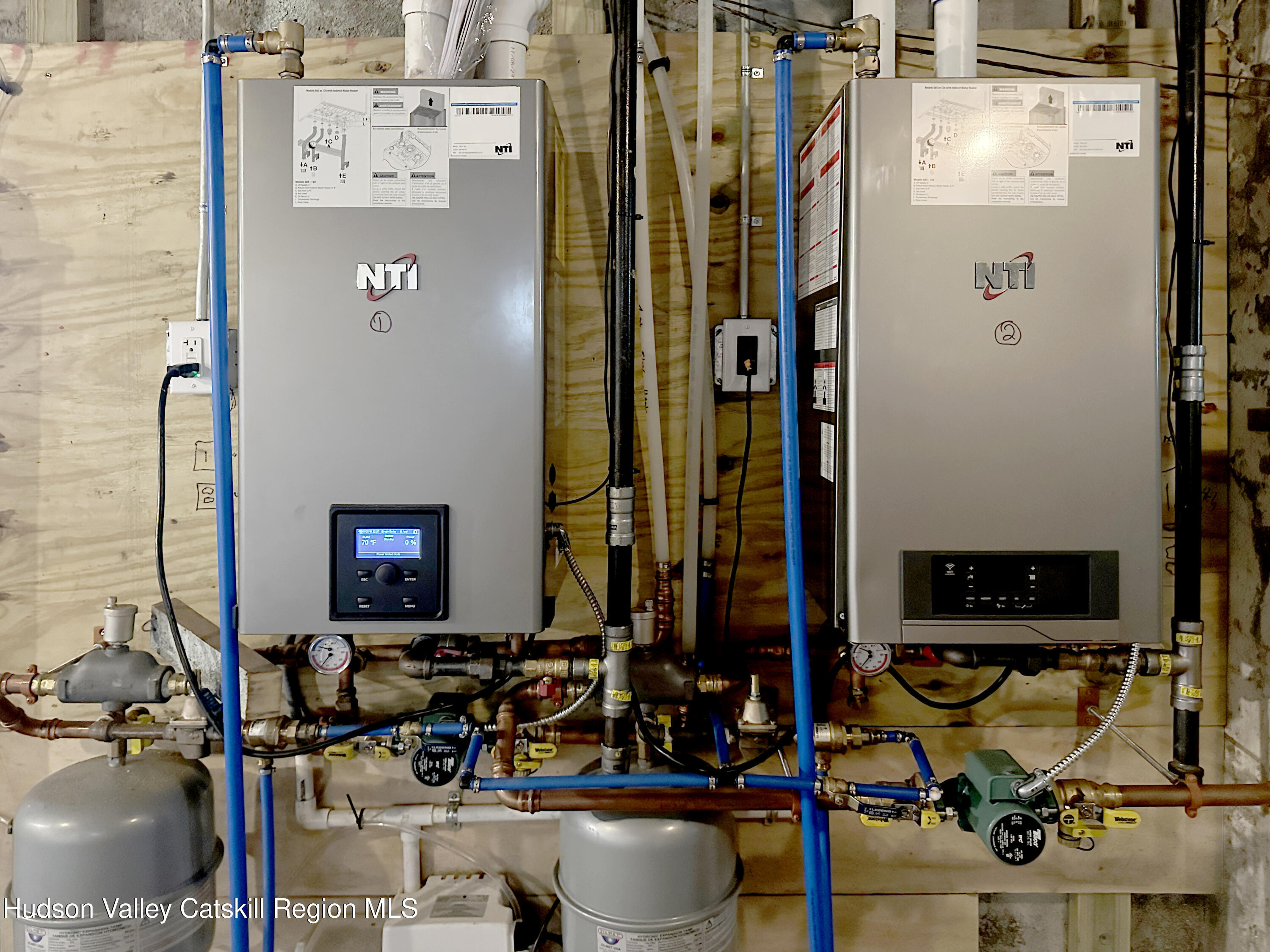 228 Mansion Street Poughkeepsie, NY 12601 - Photo 32 of 35 a picture of water heater room