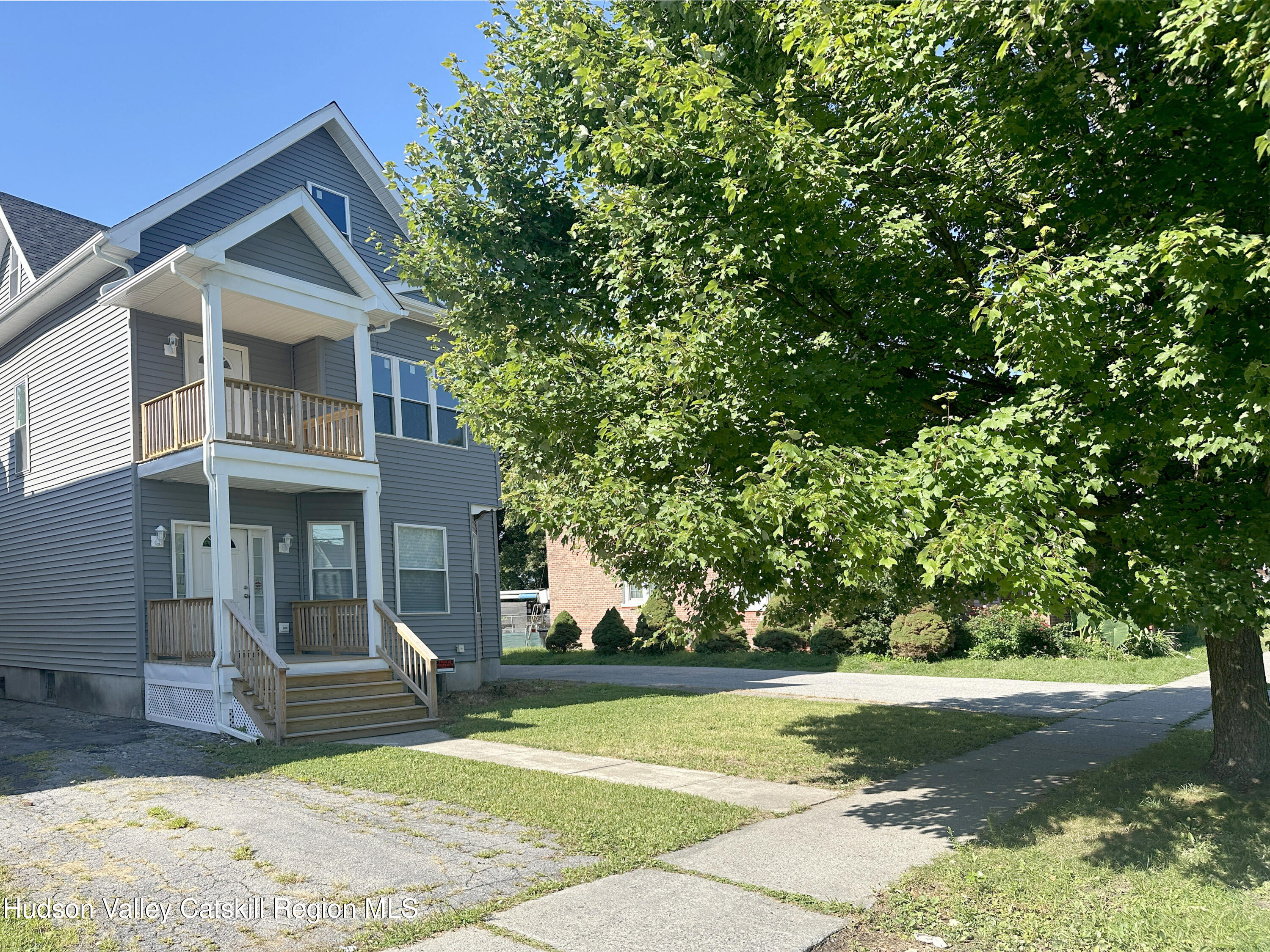 228 Mansion Street Poughkeepsie, NY 12601 - Photo 33 of 35 a front view of a house with garden