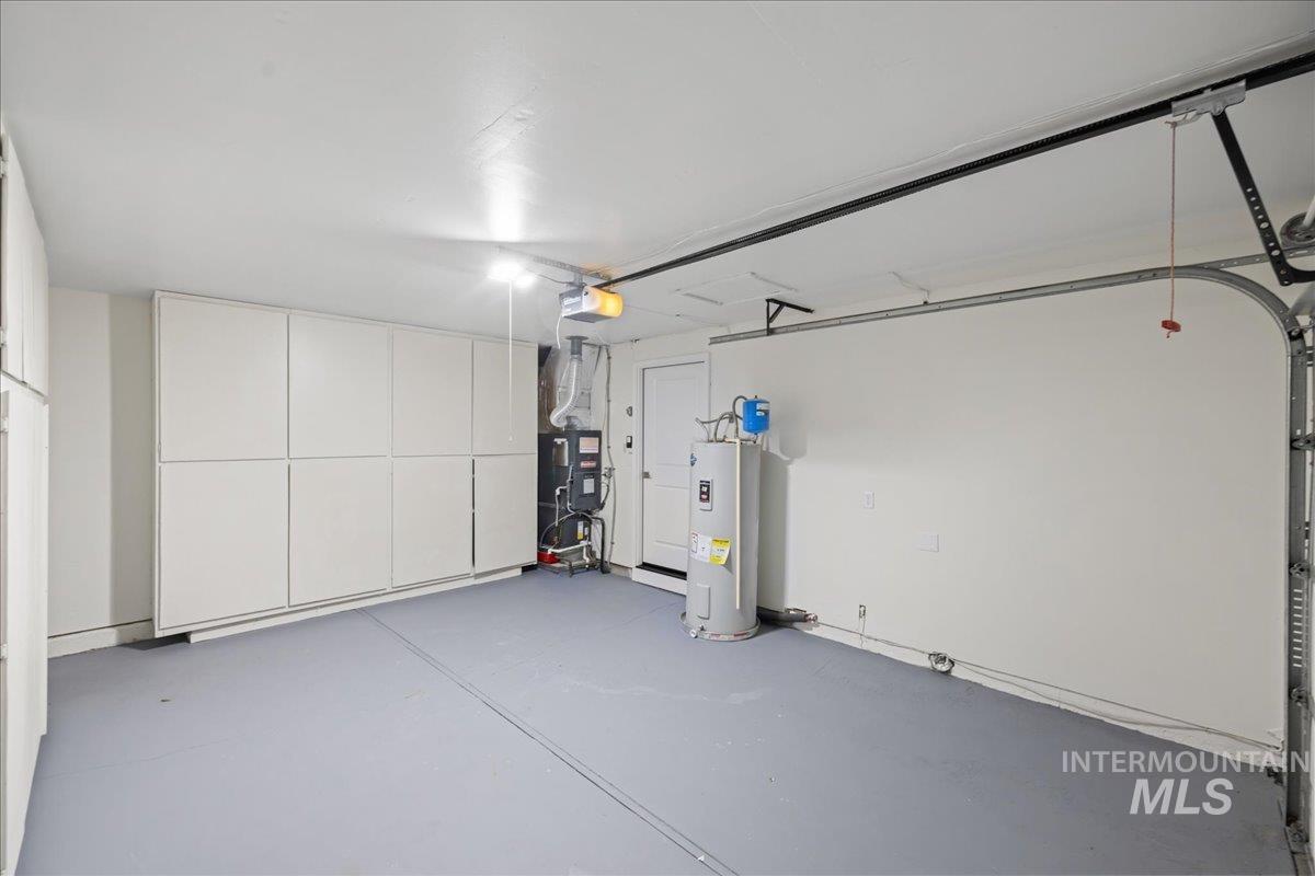 1309 West Maple Avenue Meridian, ID 83642 - Photo 18 of 50 Garage with water heater