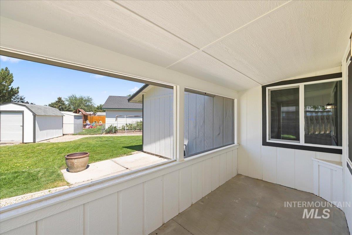 1309 West Maple Avenue Meridian, ID 83642 - Photo 20 of 50 Unfurnished sunroom with vaulted ceiling