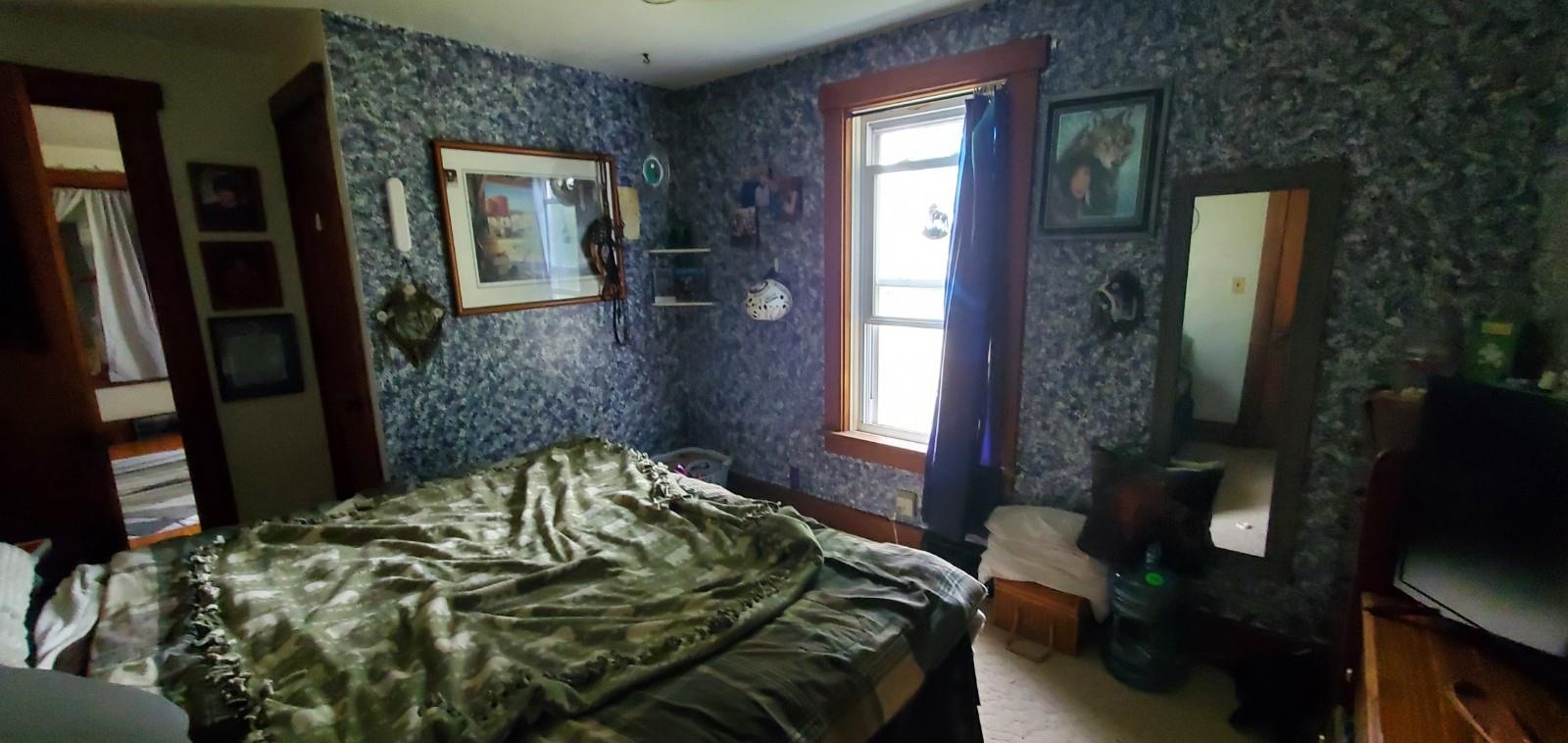 2182 Peek Home Road Dixon, IL 61021 - Photo 14 of 51 a bedroom with a bed and a mirror