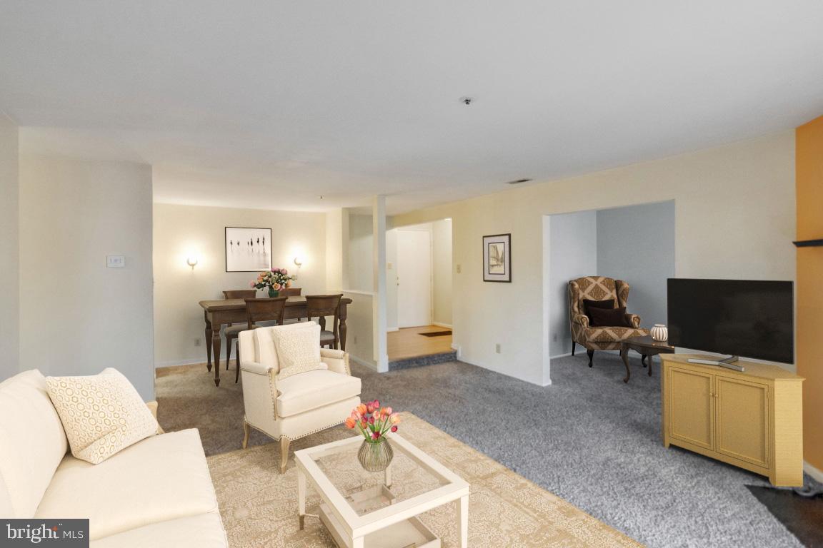 4914 Columbia Road, Unit 3 Columbia, MD 21044 - Photo 4 of 30 Virtually Staged Living Room, Dinig Room, and Den