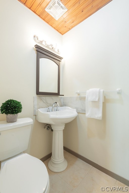 1593 Baxter Road Prince George, VA 23875 - Photo 11 of 29 a bathroom with a sink a mirror and toilet