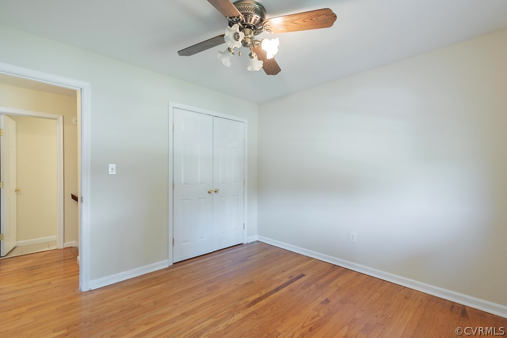 1593 Baxter Road Prince George, VA 23875 - Photo 18 of 29 wooden floor in an empty room