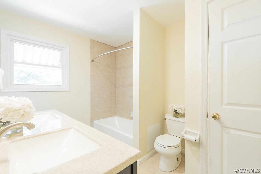 1593 Baxter Road Prince George, VA 23875 - Photo 23 of 29 a bathroom with a sink and toilet