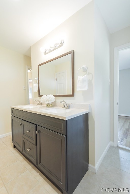 1593 Baxter Road Prince George, VA 23875 - Photo 24 of 29 a bathroom with a sink vanity and mirror