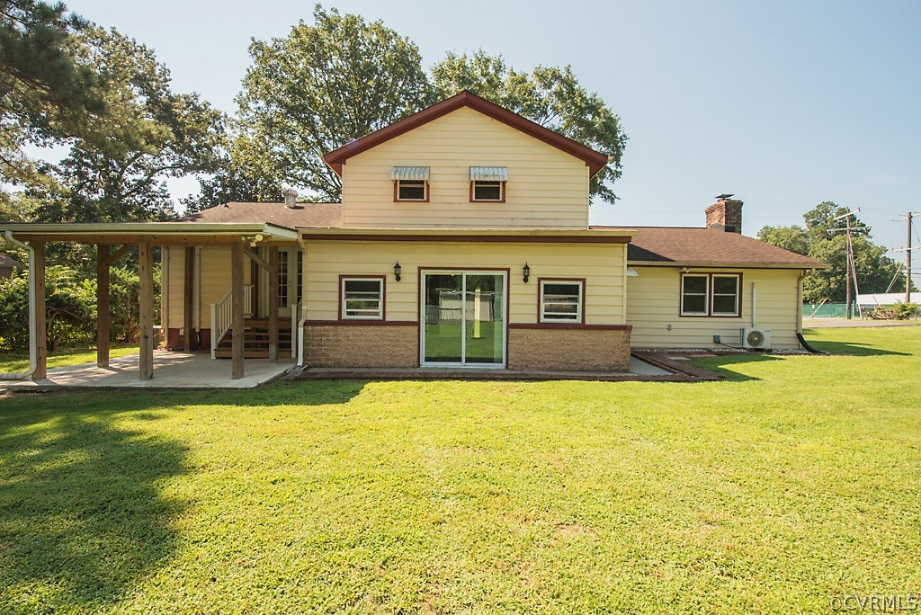 1593 Baxter Road Prince George, VA 23875 - Photo 25 of 29 a view of a house with swimming pool and a yard