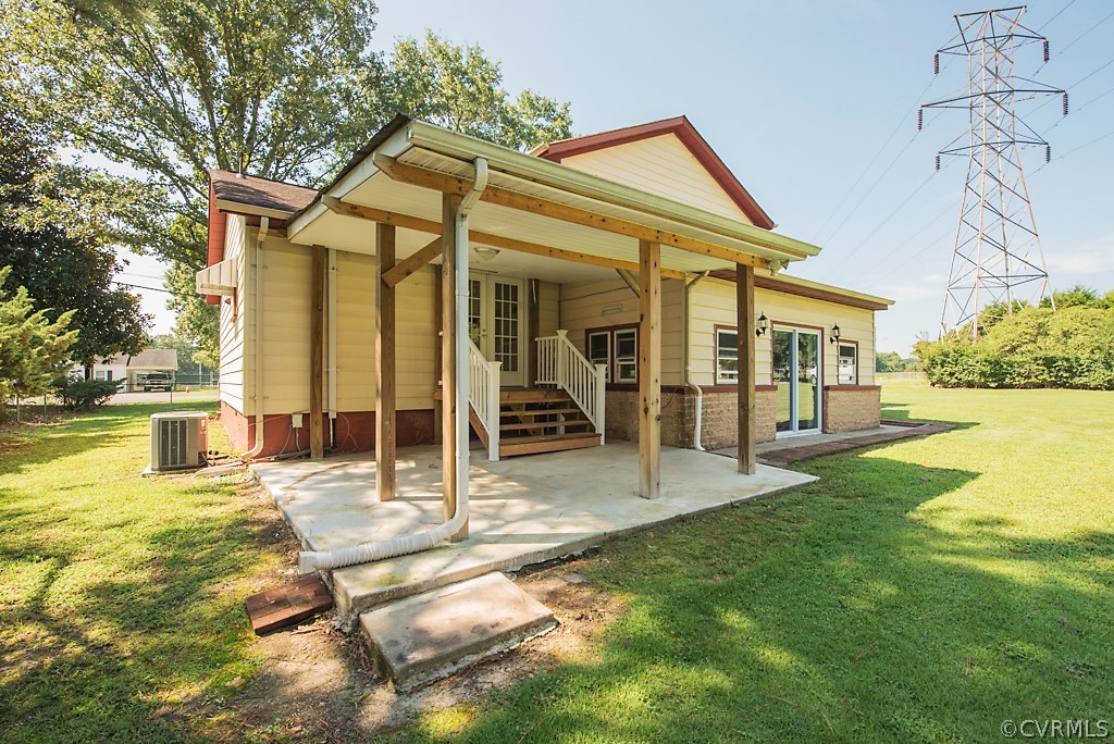 1593 Baxter Road Prince George, VA 23875 - Photo 27 of 29 a view of a house with swimming pool and sitting area