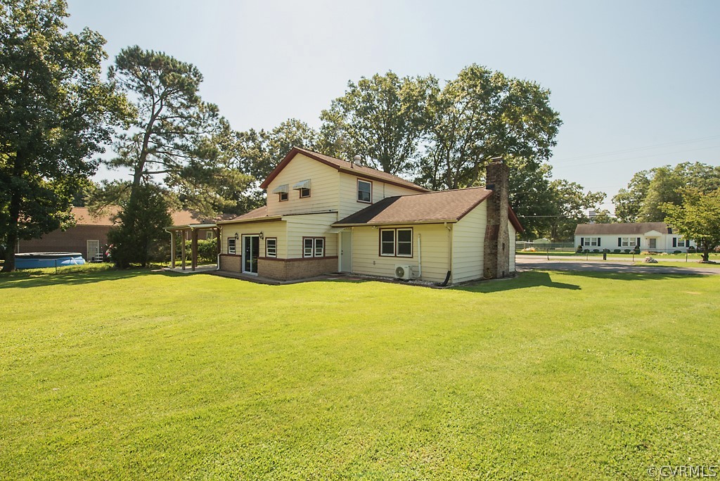 1593 Baxter Road Prince George, VA 23875 - Photo 28 of 29 a front view of a house with swimming pool