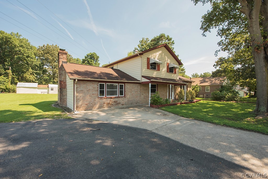 1593 Baxter Road Prince George, VA 23875 - Photo 29 of 29 a view of house with outdoor space and street view