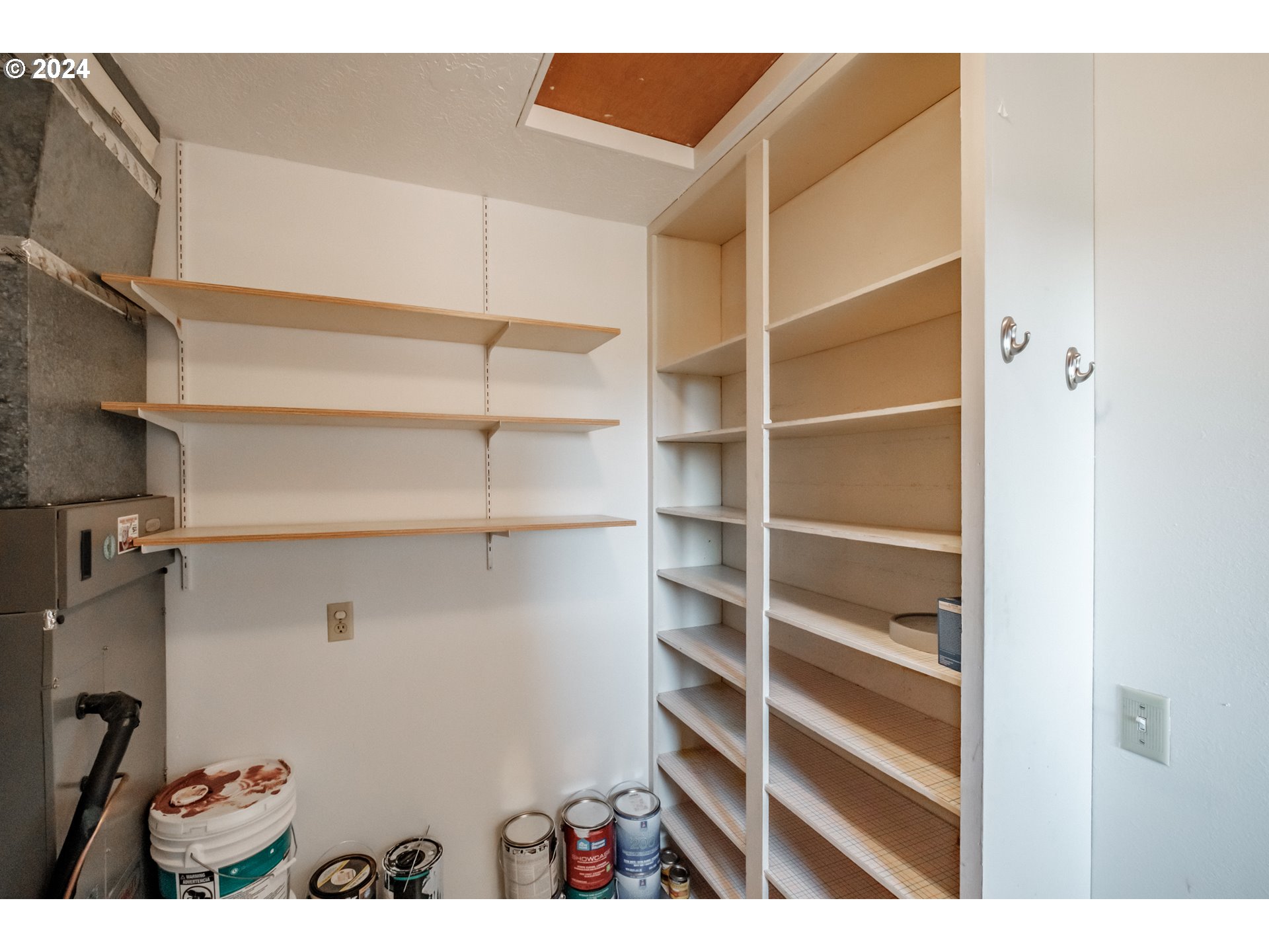 14090 Salt Creek Road Dallas, OR 97338 - Photo 11 of 41 a view of walk in closet with empty racks