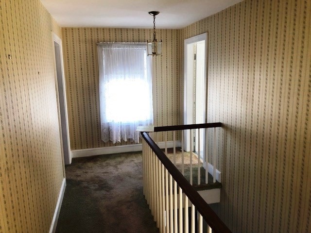 165 11th Street Lowell, MA 01850 - Photo 14 of 21 a view of entryway with wooden floor