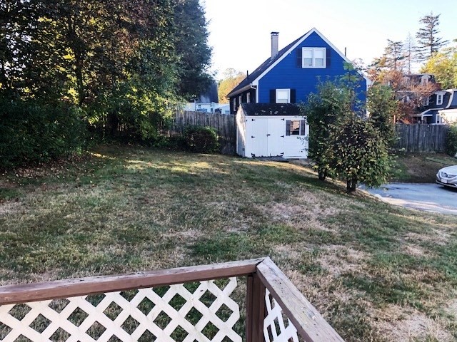 165 11th Street Lowell, MA 01850 - Photo 5 of 21 a view of a house with a yard