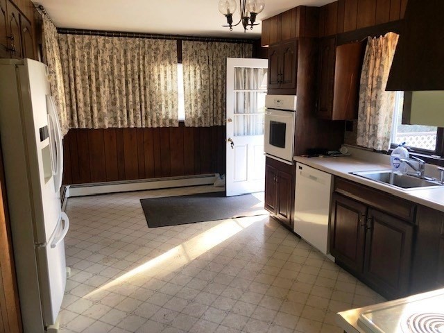 165 11th Street Lowell, MA 01850 - Photo 6 of 21 a bathroom with a sink and a mirror
