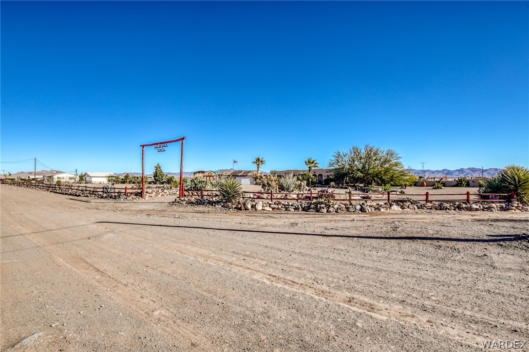4150 Dragoon Road Golden Valley, AZ 86413 - Photo 2 of 49 a view of a road with a building in the background