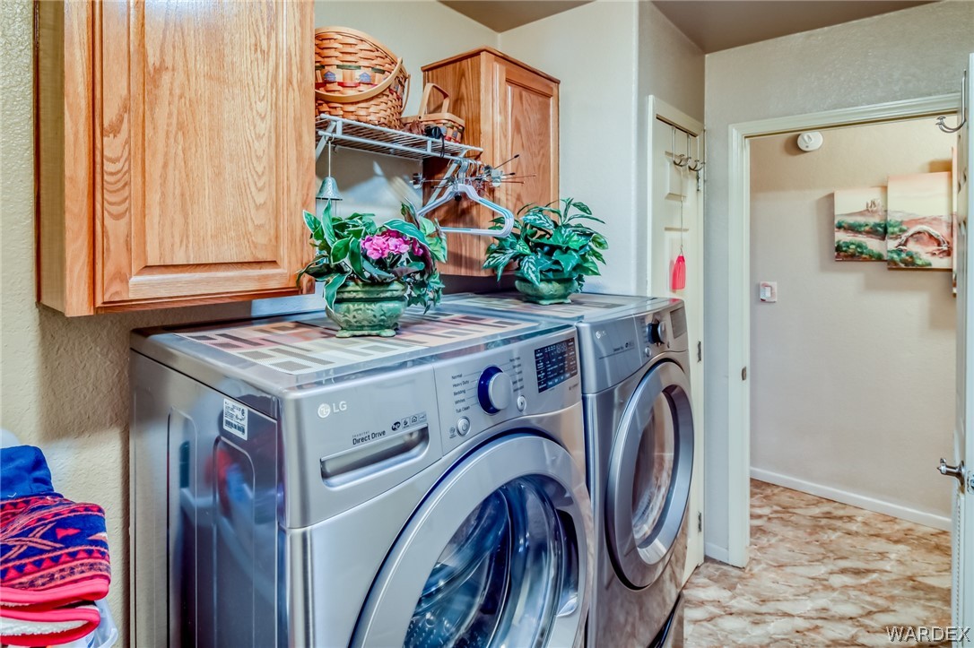 4150 Dragoon Road Golden Valley, AZ 86413 - Photo 33 of 49 a utility room with dryer and washer