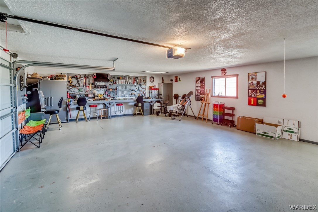 4150 Dragoon Road Golden Valley, AZ 86413 - Photo 35 of 49 a view of a garage with toys