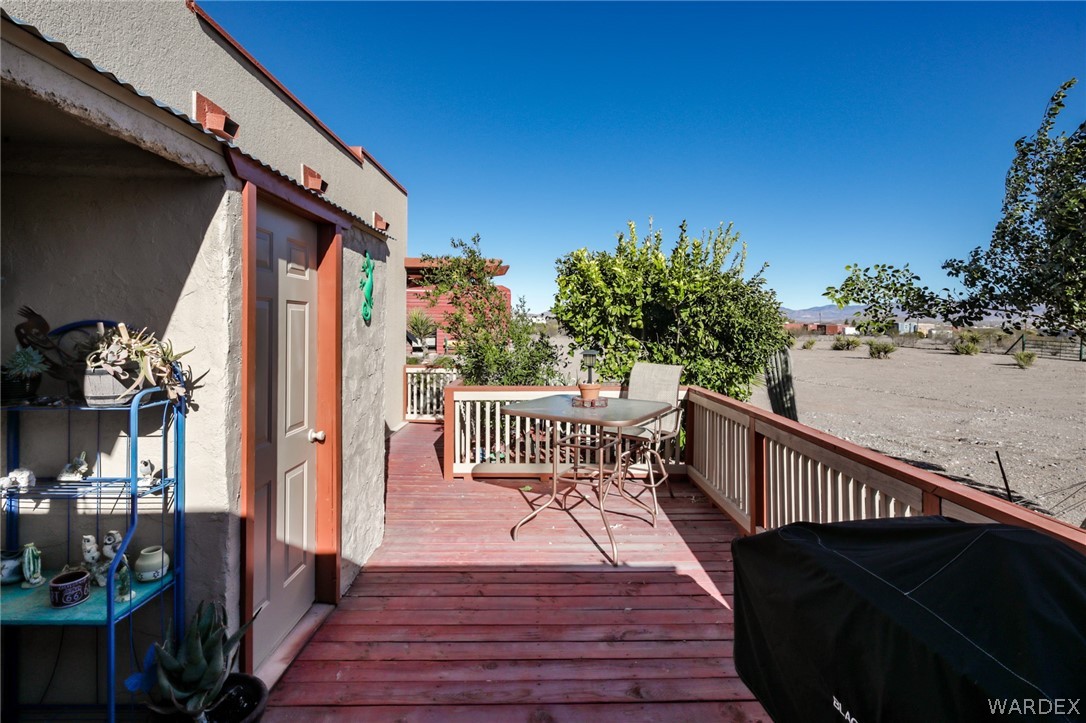 4150 Dragoon Road Golden Valley, AZ 86413 - Photo 37 of 49 a view of a house with wooden deck