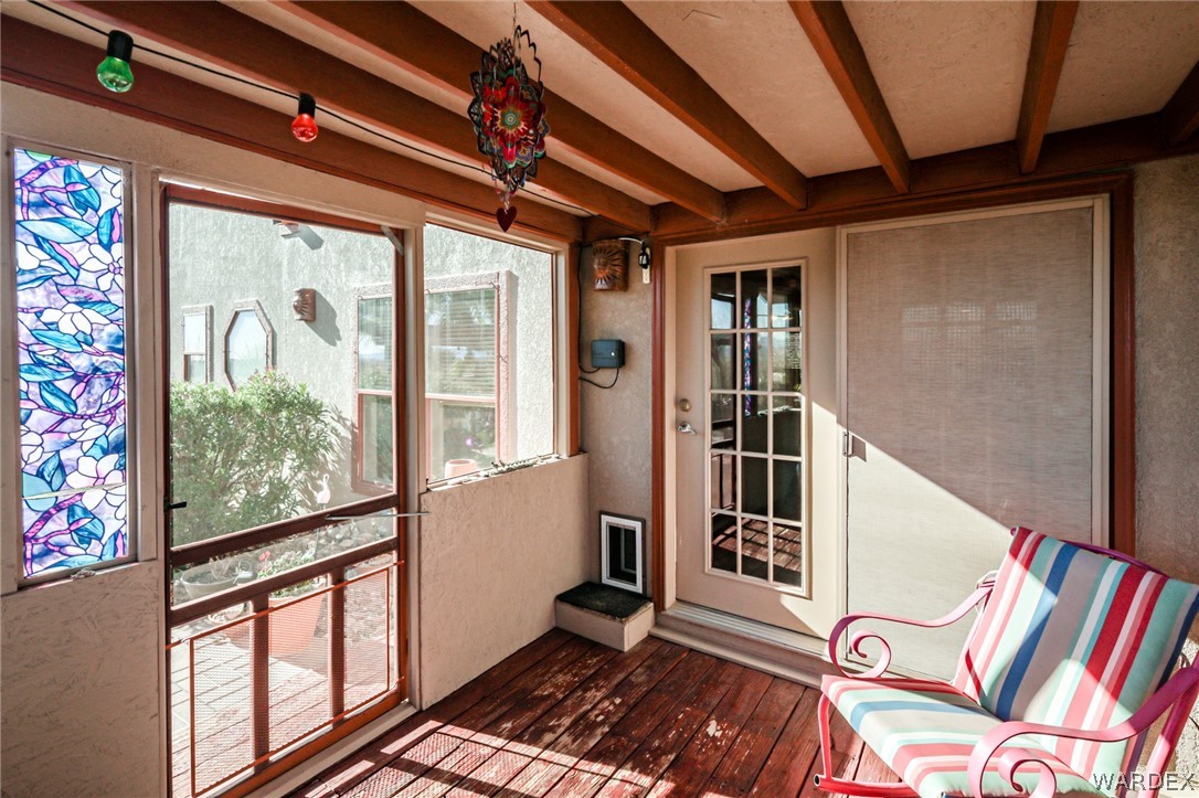 4150 Dragoon Road Golden Valley, AZ 86413 - Photo 40 of 49 a view of an entryway with wooden floor and door
