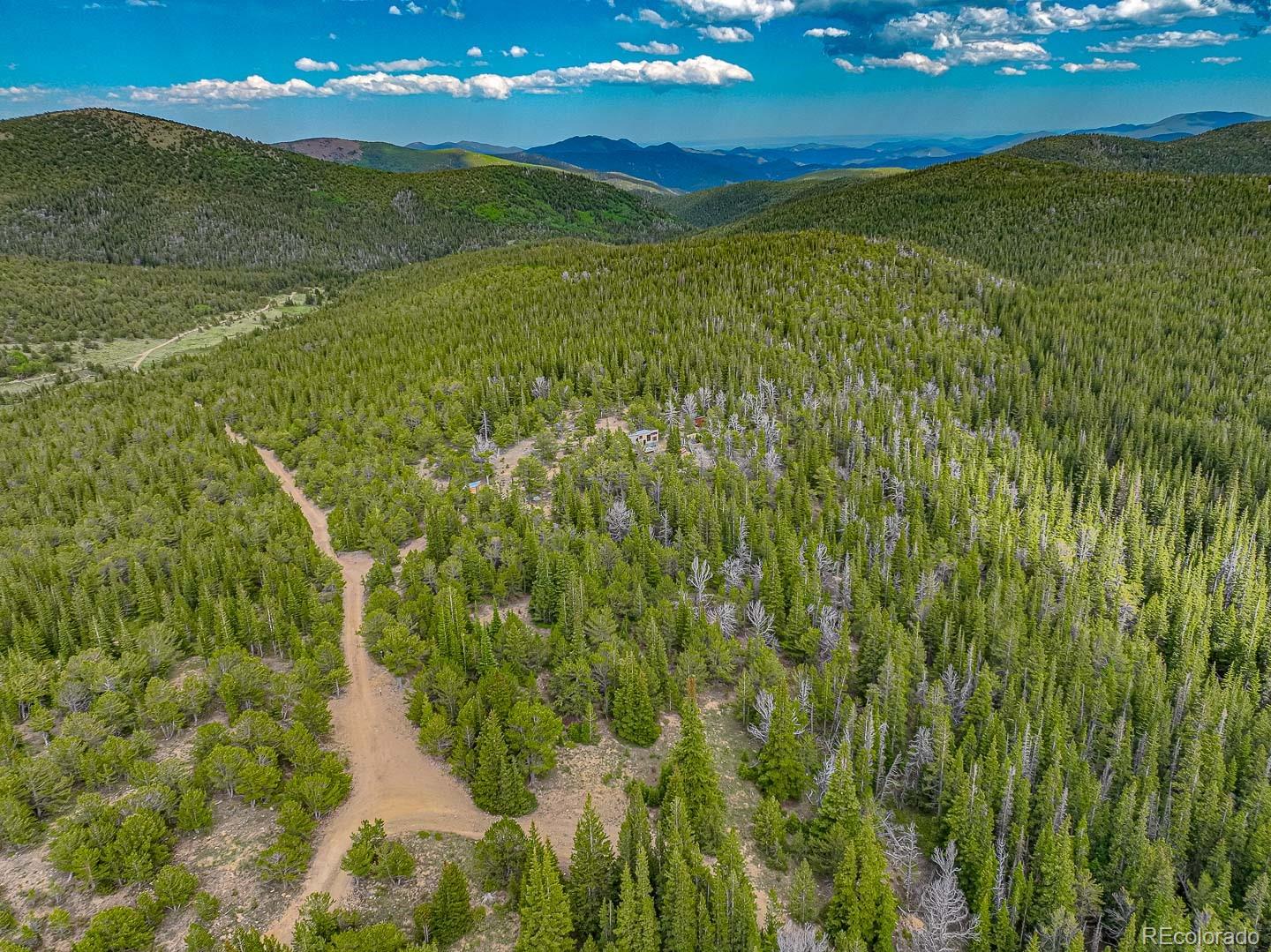 111 Mosquito Creek Road Idaho Springs, CO 80452 - Photo 25 of 50 a view of an ocean from a yard