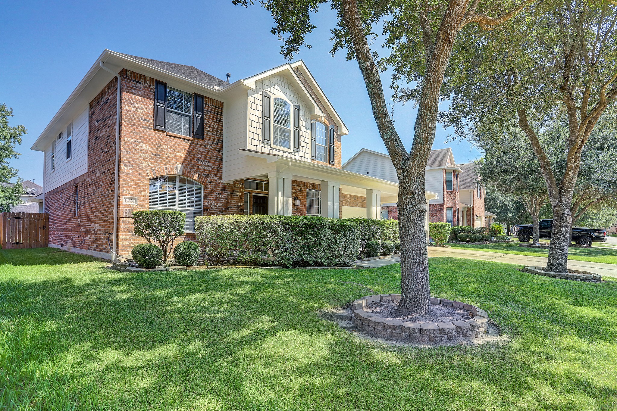 12331 Crescent Mountain Lane Humble, TX 77346 - Photo 5 of 34 a front view of a house with a yard