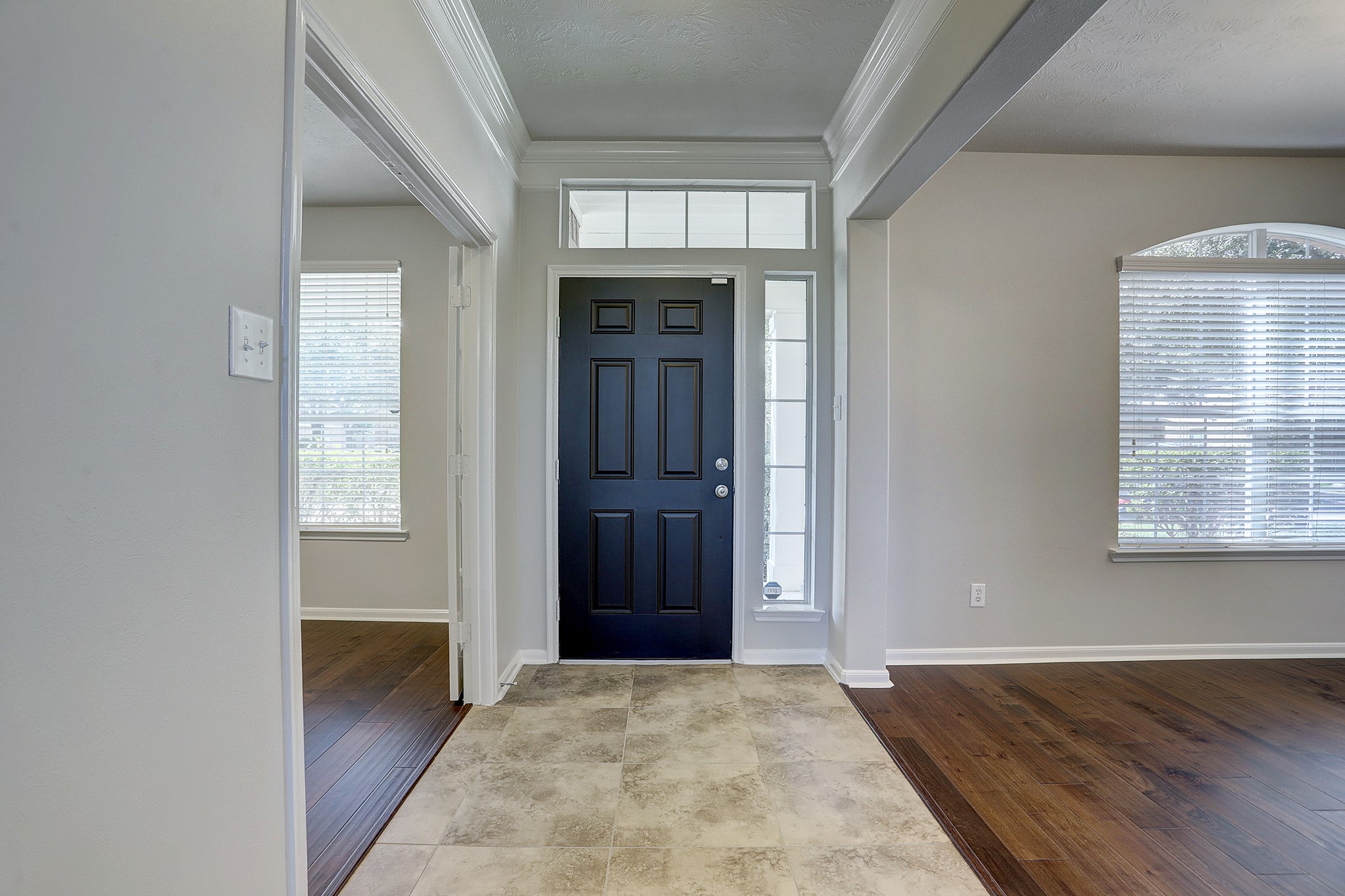 12331 Crescent Mountain Lane Humble, TX 77346 - Photo 7 of 34 an empty room with windows and cabinet