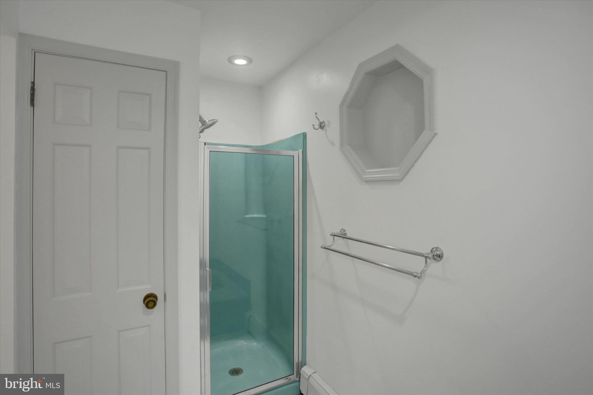 98 Peach Glen Road Gardners, PA 17324 - Photo 28 of 85 a bathroom with a glass shower door and a sink