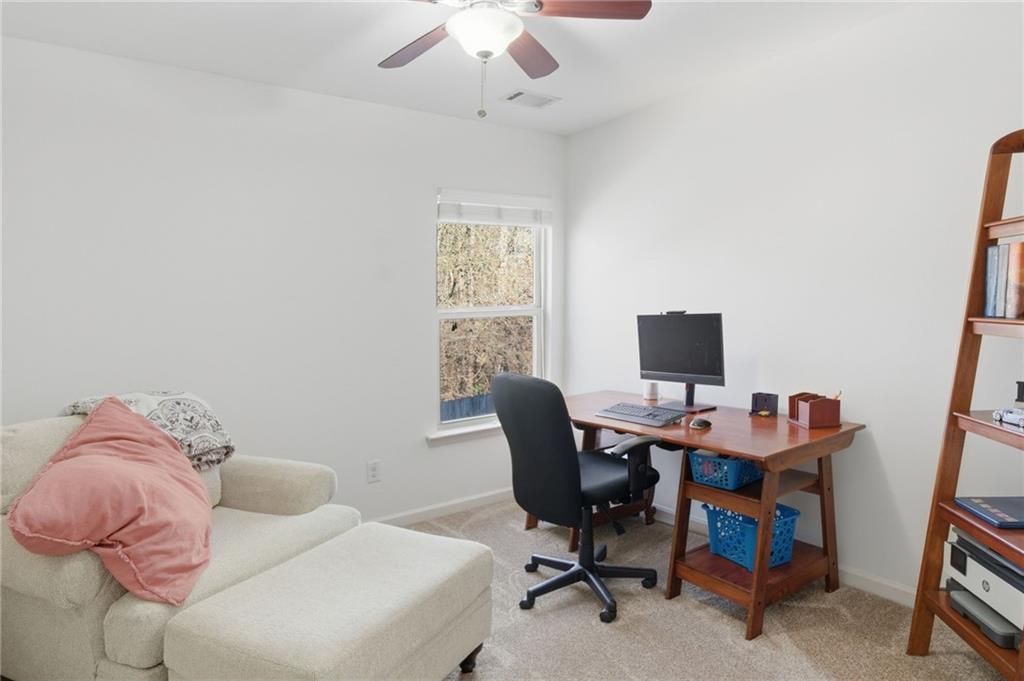 246 Manous Way Canton, GA 30115 - Photo 25 of 38 a view of a workspace with a window