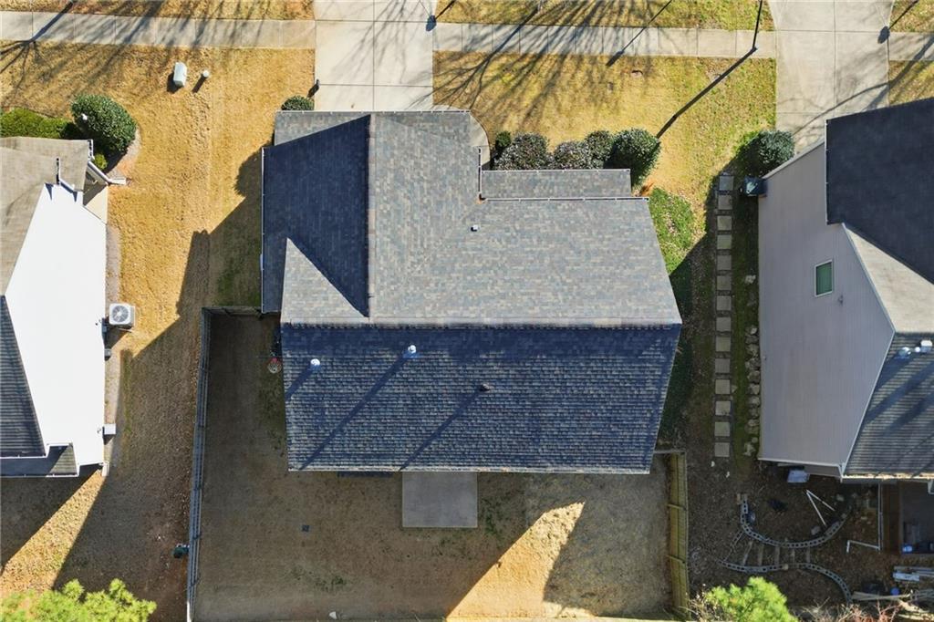 246 Manous Way Canton, GA 30115 - Photo 33 of 38 an aerial view of a house with a yard