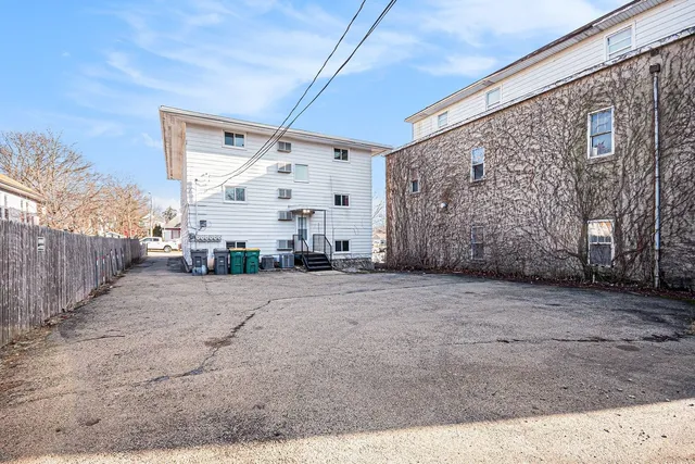 a view of a house with a street