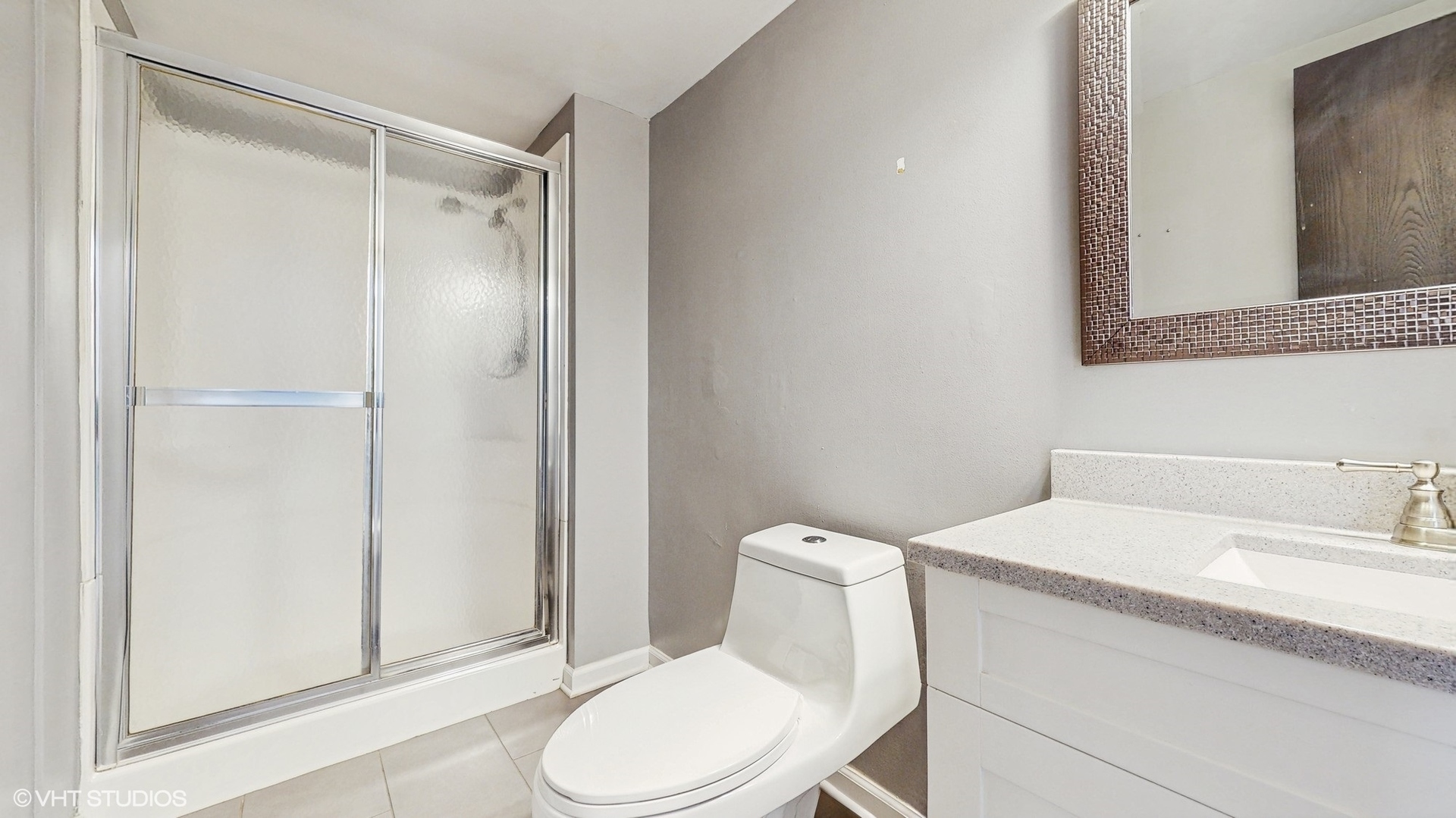 2525 Ridge Road Aurora, IL 60504 - Photo 29 of 36 a white toilet sitting next to a bathroom sink
