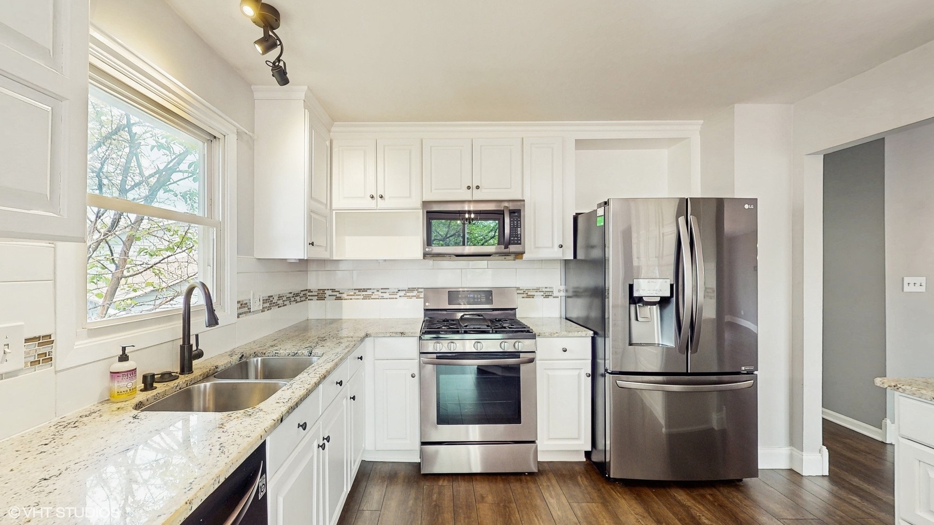 2525 Ridge Road Aurora, IL 60504 - Photo 3 of 36 a kitchen with a refrigerator sink and microwave