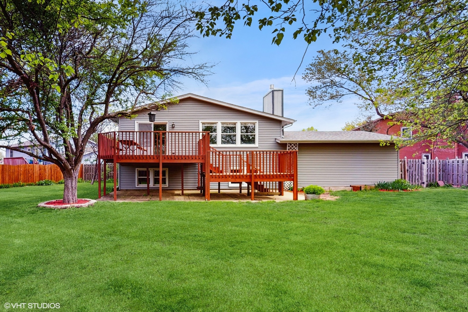 2525 Ridge Road Aurora, IL 60504 - Photo 31 of 36 a view of a house with a big yard and large trees