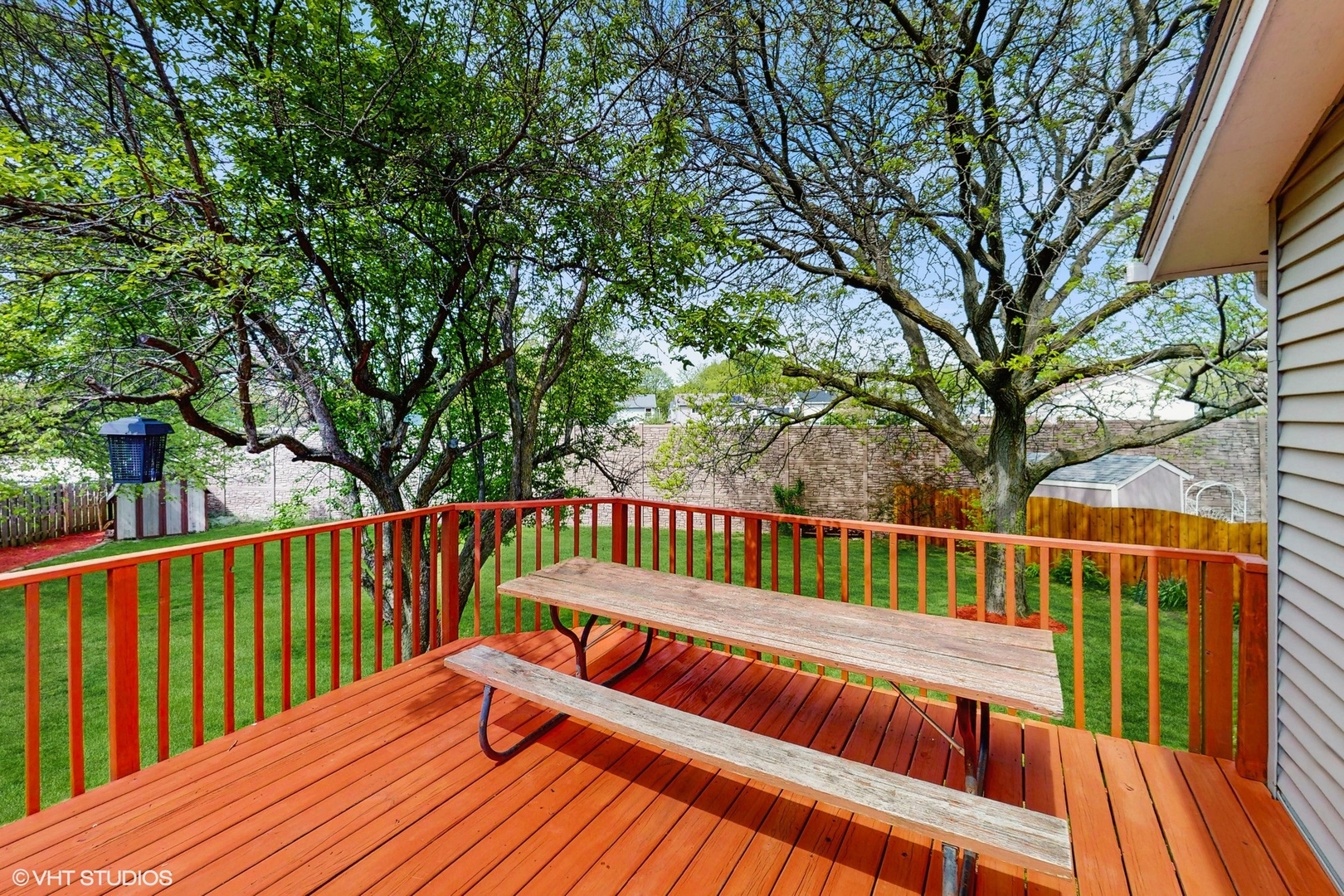 2525 Ridge Road Aurora, IL 60504 - Photo 34 of 36 a view of balcony with wooden floor and fence