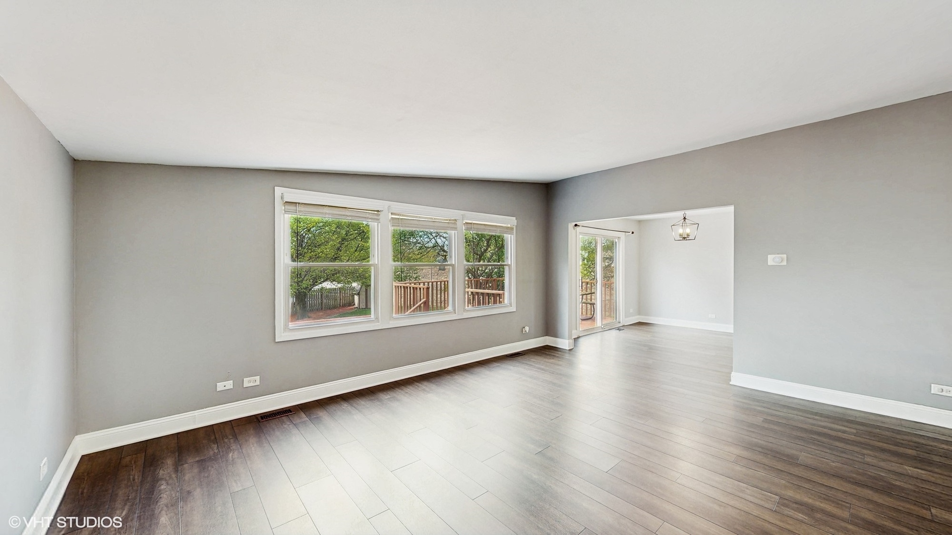 2525 Ridge Road Aurora, IL 60504 - Photo 9 of 36 an empty room with wooden floor and windows