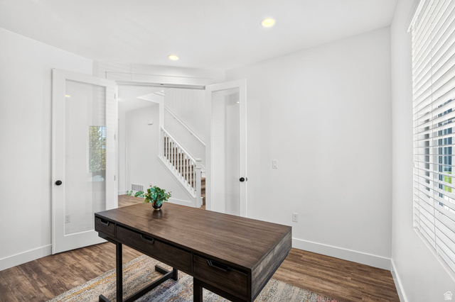 6536 West Muirfield Road Highland, UT 84003 - Photo 12 of 48 Room featuring white walls, recessed lighting, and wood-finish flooring