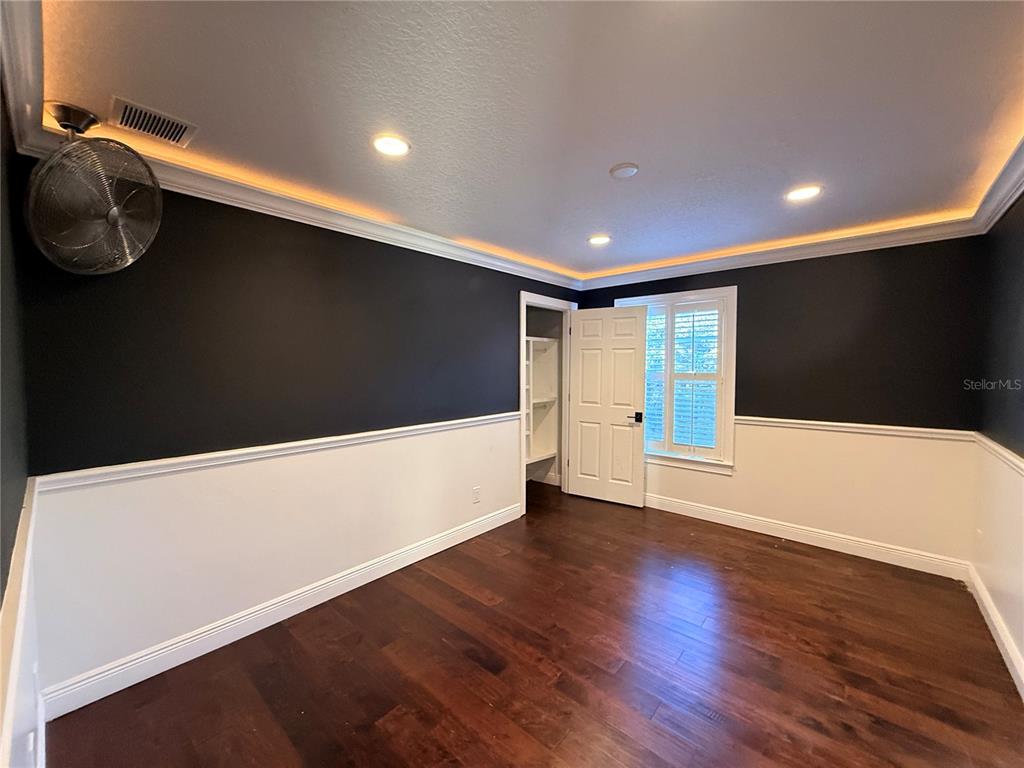 910 Pawstand Road Celebration, FL 34747 - Photo 21 of 33 a view of livingroom with wooden floor