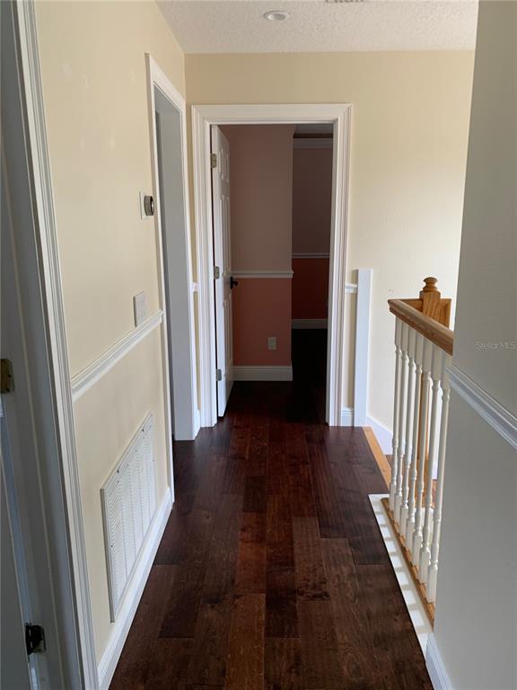 910 Pawstand Road Celebration, FL 34747 - Photo 23 of 33 a view of a hallway