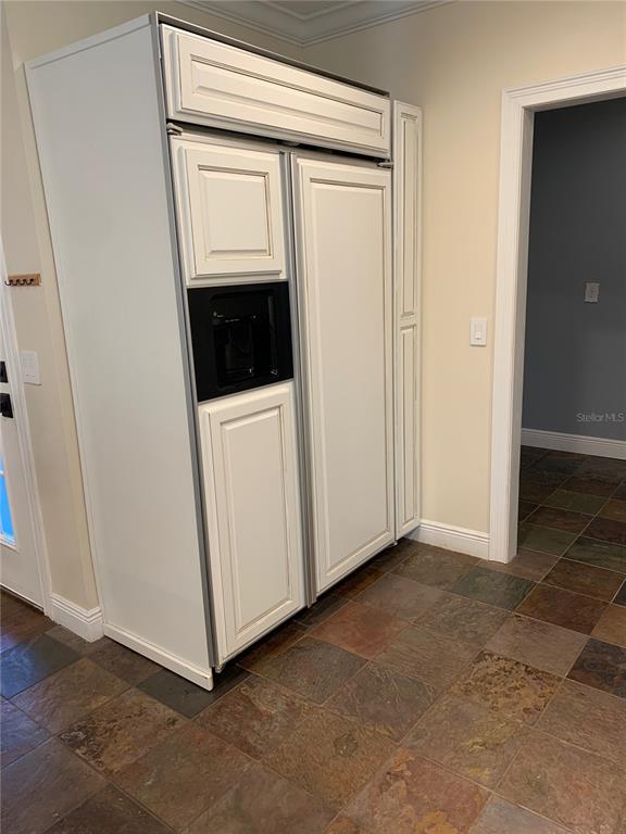 910 Pawstand Road Celebration, FL 34747 - Photo 27 of 33 a view of hallway with washer and dryer