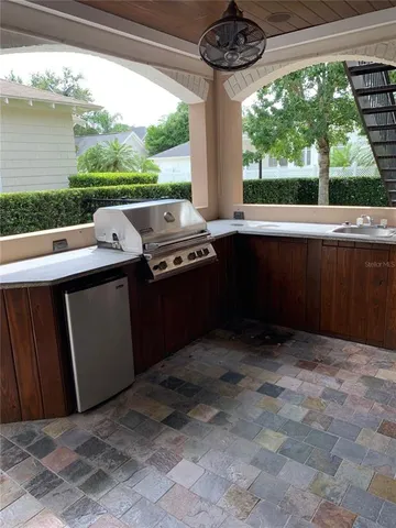 a bathroom with a sink toilet and mirror