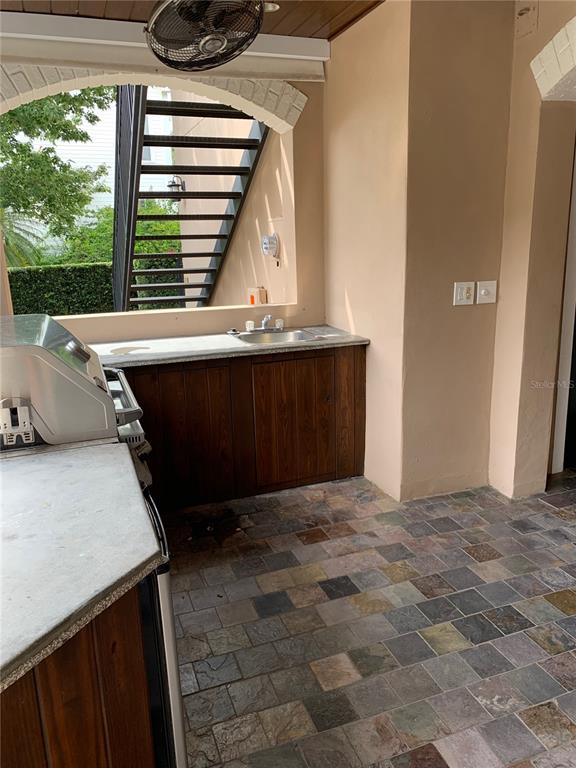 910 Pawstand Road Celebration, FL 34747 - Photo 9 of 33 a view of outdoor space and barbecue grill