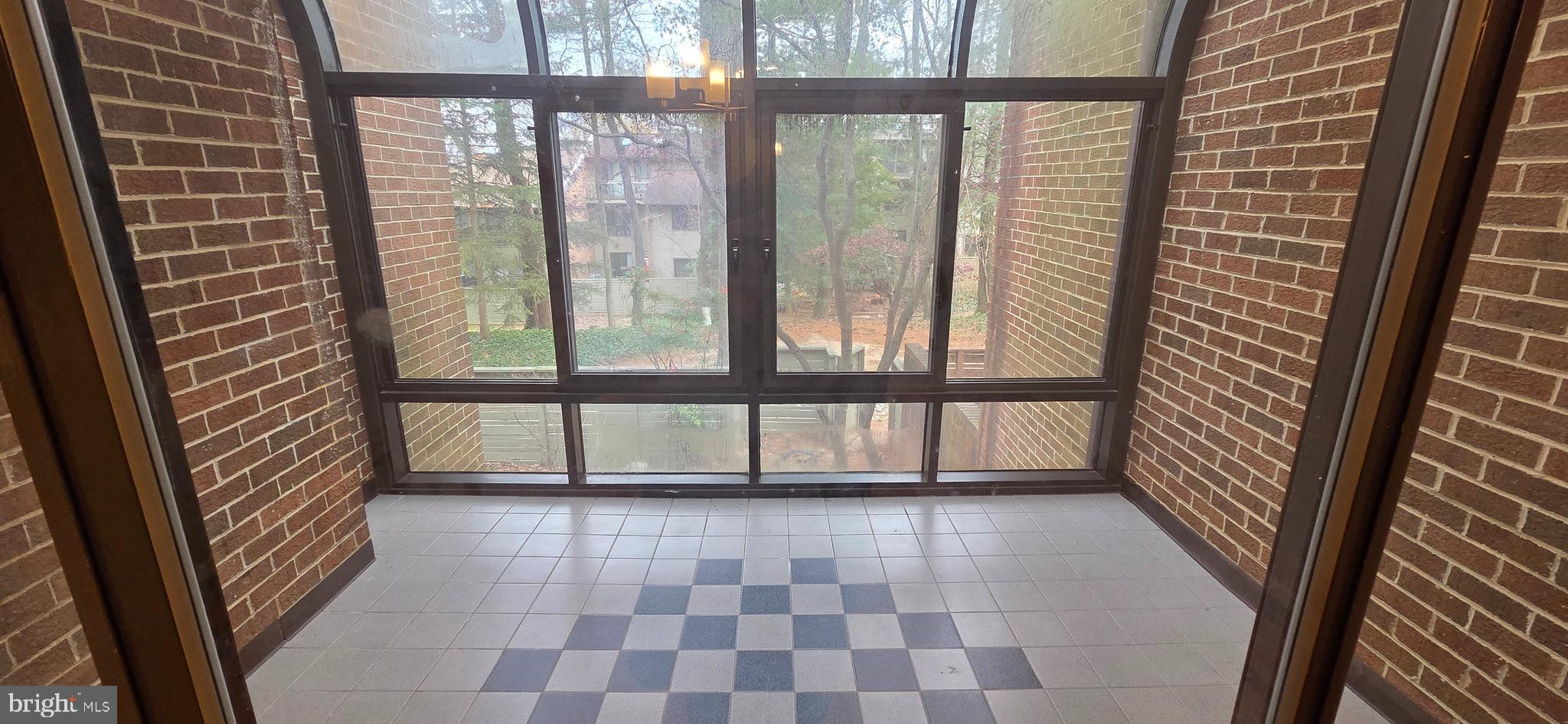 11764 Indian Ridge Road Reston, VA 20191 - Photo 11 of 31 a view of entryway with a window
