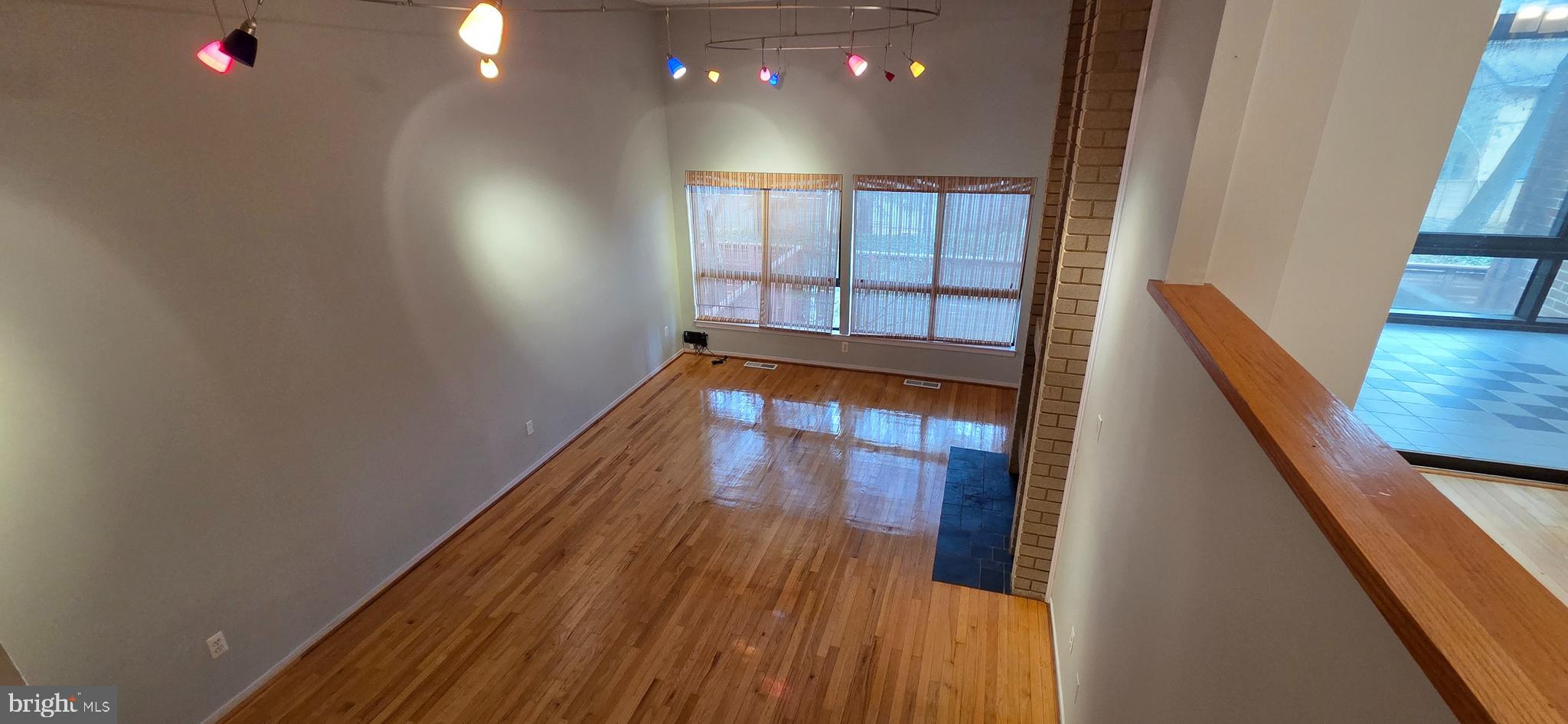 11764 Indian Ridge Road Reston, VA 20191 - Photo 13 of 31 a view of balcony with wooden floor