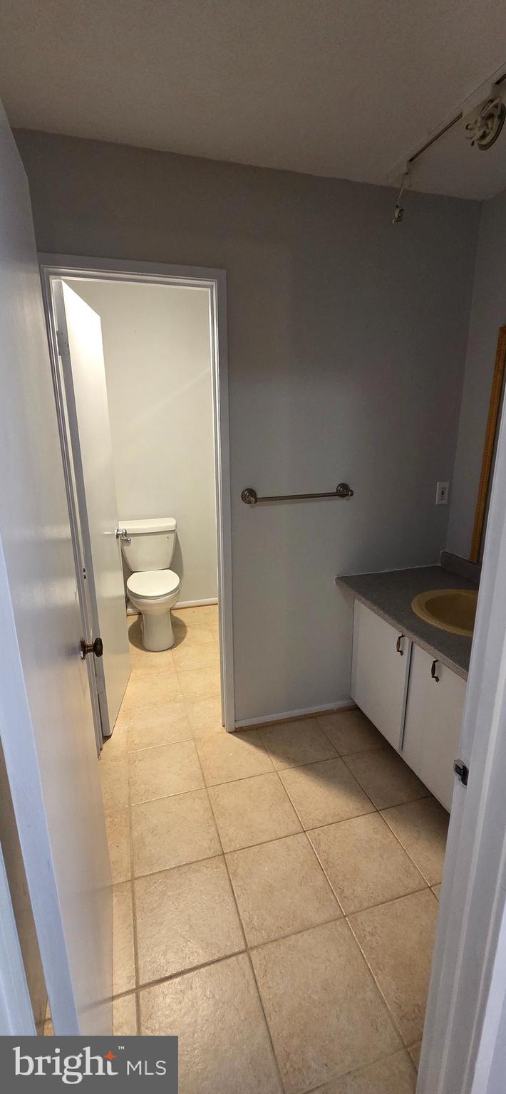 11764 Indian Ridge Road Reston, VA 20191 - Photo 22 of 31 a view of a walk in closet