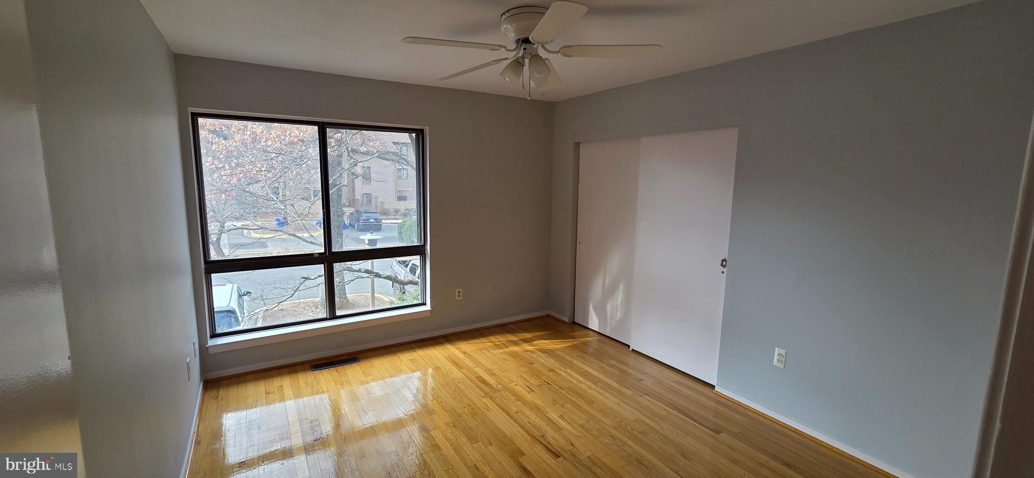 11764 Indian Ridge Road Reston, VA 20191 - Photo 26 of 31 an empty room with windows and closet