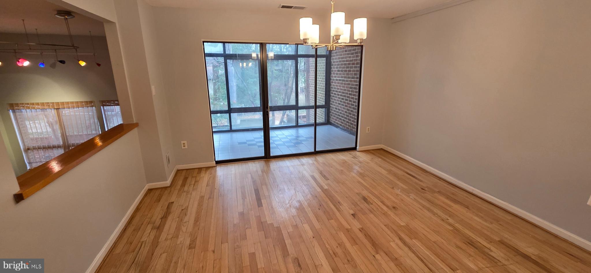 11764 Indian Ridge Road Reston, VA 20191 - Photo 8 of 31 a view of entryway with wooden floor