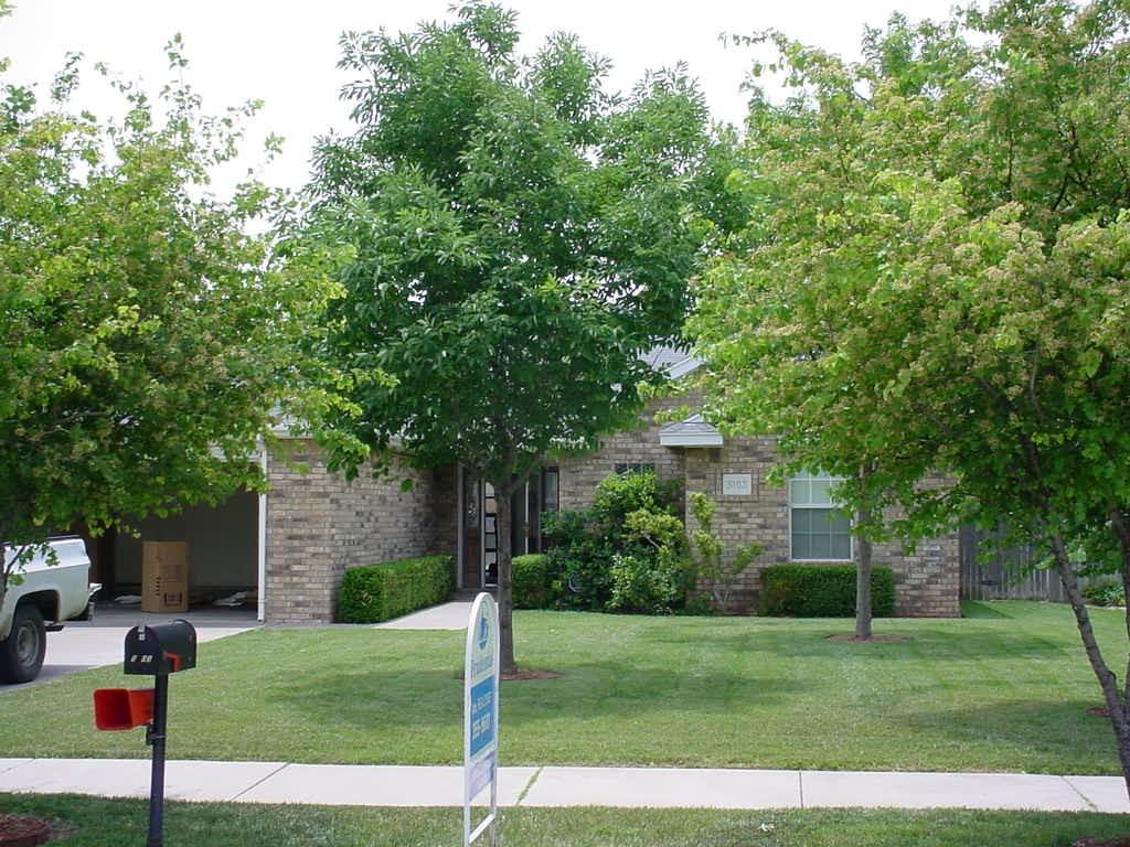 5103 Gary Lane Amarillo, TX 79110 - Photo 1 of 1 a front view of a house with a yard