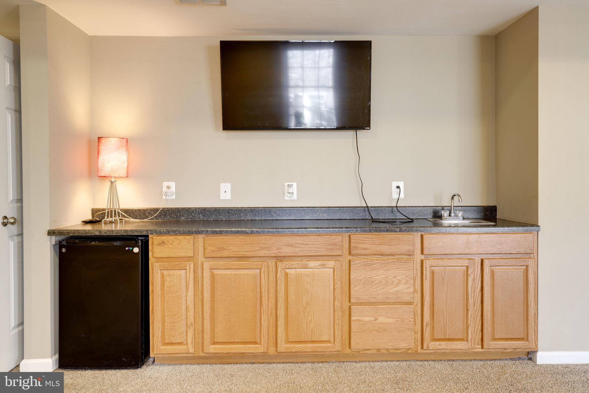 6363 Yates Ford Road Manassas, VA 20111 - Photo 37 of 53 Wet Bar with TV and Mini Refrigerator