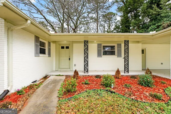 a front view of house with yard